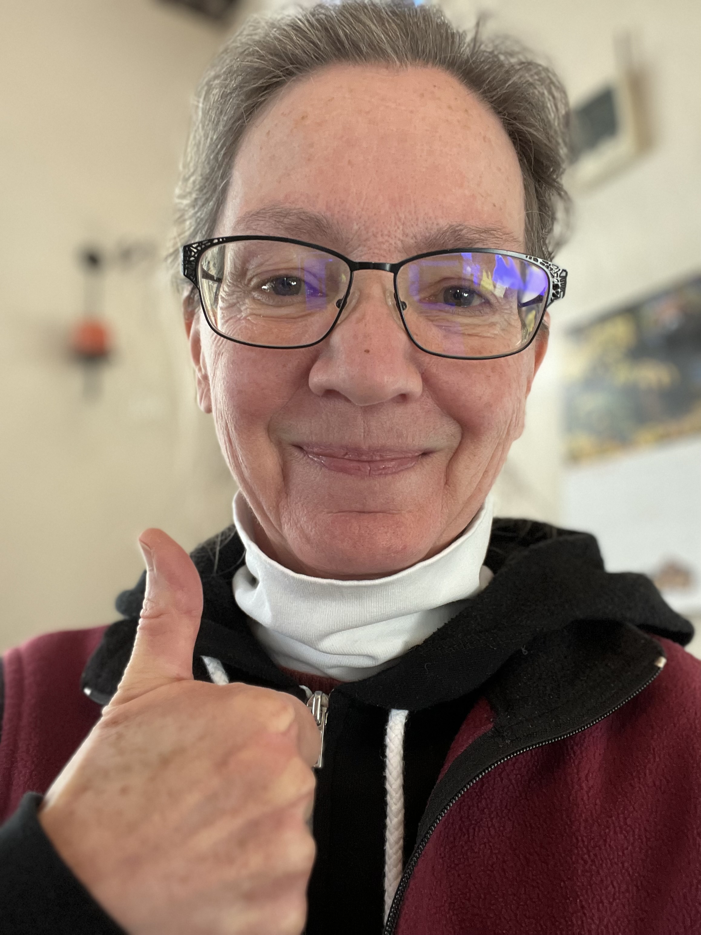 Picture of a happy person with a "thumbs up".